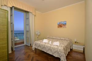 A bed or beds in a room at Casa Alice