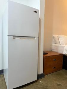 Postel nebo postele na pokoji v ubytování Tribeca Hotel FiDi