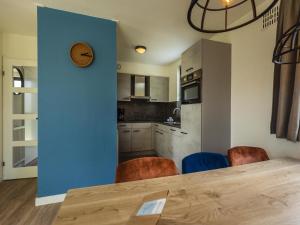 Kuchyň nebo kuchyňský kout v ubytování Detached holiday home near Nijmegen