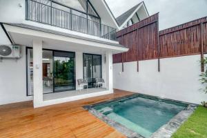 Πισίνα στο ή κοντά στο Six Stars Townhouse A2 Brand New 2 Bedroom in Canggu