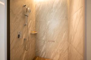 Qinglian Jinghe Hotel Wuhan Zoo International Expo Center Branch的一间浴室