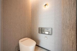 Qinglian Jinghe Hotel Wuhan Zoo International Expo Center Branch的一间浴室