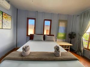 Letto o letti in una camera di Koh Rong Love Camp