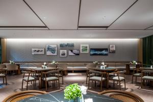 Qinglian Jinghe Hotel Wuhan Zoo International Expo Center Branch的休息区