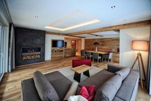 Predel za sedenje v nastanitvi Hotel Dorfstadl