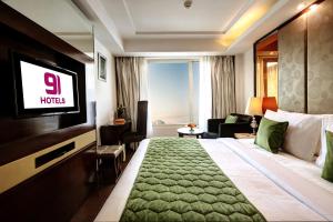 TV a/nebo společenská místnost v ubytování Flute Boutique by Hotel 91