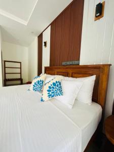 Letto o letti in una camera di NN Beach Resort Nilaveli