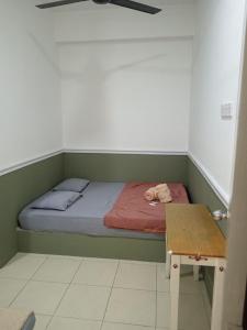 Ein Bett oder Betten in einem Zimmer der Unterkunft Hotel Seri Intan Tampin