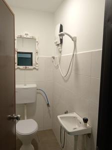 Ein Badezimmer in der Unterkunft Hotel Seri Intan Tampin