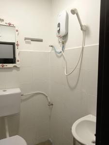 Ein Badezimmer in der Unterkunft Hotel Seri Intan Tampin