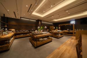 a store with several tables in a large room at Hotel Enoe Hakodate in Hakodate