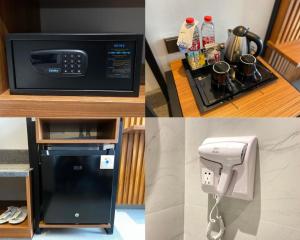 a kitchen with a microwave and a counter with a phone at Nata Azana Hotel Ngawi in Ngawi