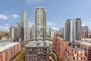 an aerial view of a city with tall buildings at Modern 2 Bed Heart of Elephant Castle in London