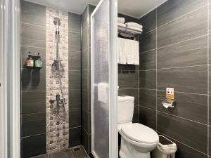 Koupelna v ubytování 悦心旅Yesing Hotel + 37 fotografií