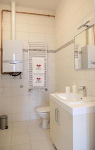 Ένα μπάνιο στο Apartamenty w sercu Chełmna +38 φωτογραφίες