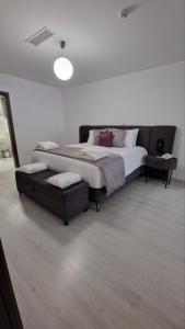 A bed or beds in a room at International Atene hotel