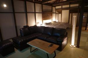Posezení v ubytování TAKUMI HOTEL tarumi