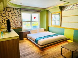 Krevet ili kreveti u jedinici u objektu 富士Outlet温泉Hotel