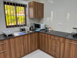 Kuchyň nebo kuchyňský kout v ubytování Sun and Sea Self Catering