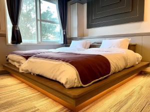 Krevet ili kreveti u jedinici u objektu 富士Outlet温泉Hotel