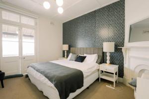 Ένα ή περισσότερα κρεβάτια σε δωμάτιο στο Golden Dream