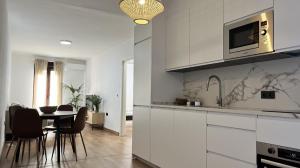 Kuchyňa alebo kuchynka v ubytovaní Apartamento MMG + 11 fotografií