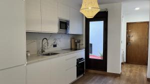 Kuchyňa alebo kuchynka v ubytovaní Apartamento MMG