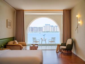 Posezení v ubytování 汕头妈屿蓝MASULAND Sea View Hotel