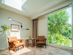 Posezení v ubytování 汕头妈屿蓝MASULAND Sea View Hotel
