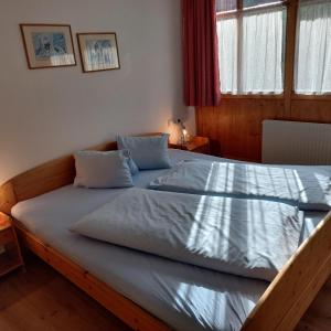 Posteľ alebo postele v izbe v ubytovaní Holiday Appartements + 9 fotografií