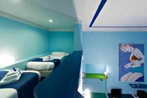 Posteľ alebo postele v izbe v ubytovaní Correra 241 Lifestyle Hotel