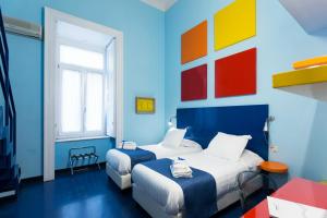 Posteľ alebo postele v izbe v ubytovaní Correra 241 Lifestyle Hotel
