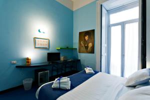Posteľ alebo postele v izbe v ubytovaní Correra 241 Lifestyle Hotel