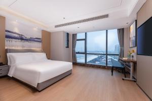 Fotografie z fotogalerie ubytování Yilong Michael International Hotel Suzhou Industrial Park Nanhuanqiao Market Branch v destinaci Jiangtian