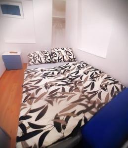 Posteľ alebo postele v izbe v ubytovaní Arbes apartman