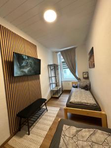 Postel nebo postele na pokoji v ubytování Ferienwohnung Zeitz Appartment Moritzburg