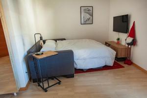 Postel nebo postele na pokoji v ubytování Apart Vinschgau