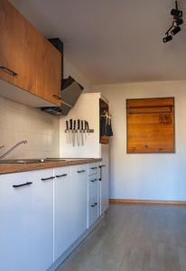 Kuchyň nebo kuchyňský kout v ubytování Apart Vinschgau
