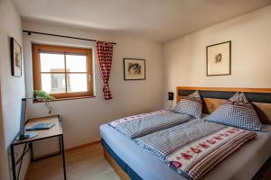 Postel nebo postele na pokoji v ubytování Apart Vinschgau