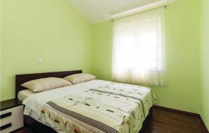 Łóżko lub łóżka w pokoju w obiekcie Apartment Ribnica-Krusevo With Sea View Xi