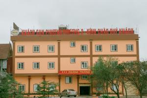 a building with a sign on the top of it at Phương Phương 2 Hotel in Ha Tinh +29 photos