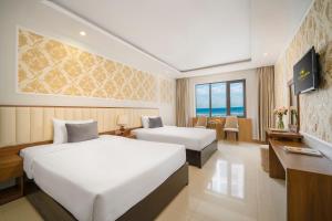 TV a/nebo společenská místnost v ubytování 7 Seven Sea Hotel