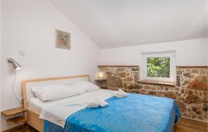 Łóżko lub łóżka w pokoju w obiekcie Pet Friendly Home In Brzac With Wifi