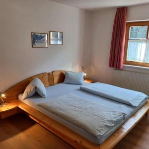 Posteľ alebo postele v izbe v ubytovaní Holiday Appartements