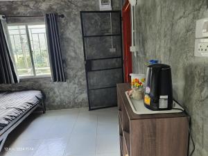Postel nebo postele na pokoji v ubytování Baan Suan Mae Klang Luang