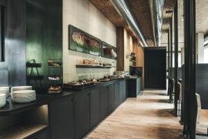 Kuchyň nebo kuchyňský kout v ubytování Hotel Arlmont 4 Stern Superior