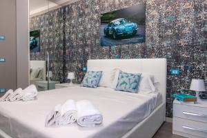 Postel nebo postele na pokoji v ubytování Scuderia il Costa