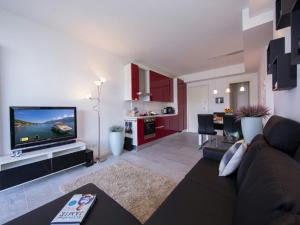 Μια τηλεόραση ή/και κέντρο ψυχαγωγίας στο Casa Laura Apt 3