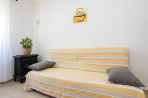 Ein Sitzbereich in der Unterkunft Apartment Andjelko G