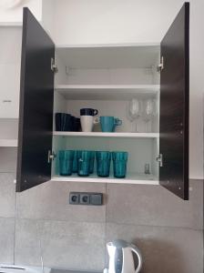 Kuchyň nebo kuchyňský kout v ubytování Apartmány Kortan